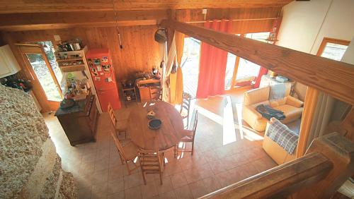 an overhead view of a living room with a table and chairs at Le Jardingue - Chambres d'Hôtes in Saint-Moreil