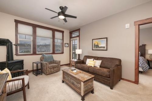 a living room with a couch and a table at Cozens Pointe Building G Unit 202 in Fraser