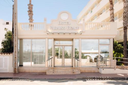 a hotel entrance with a sign for the hotel raja beach at BLUESEA Paraiso Beach - Adults Only in Es Cana