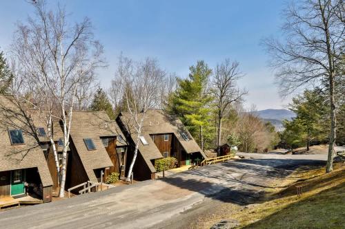 a row of homes with a driveway at Windham Mountain Condo with Deck & Stunning Views in Windham