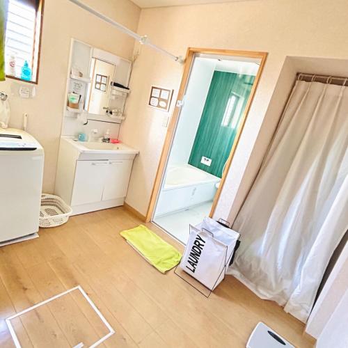 a bathroom with a sink and a mirror at Makeit 1to3 - Vacation STAY 17354 in Chichibu