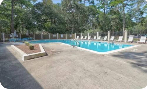 On Island | Pool | Tennis | Pet Friendly | Parking photo 12