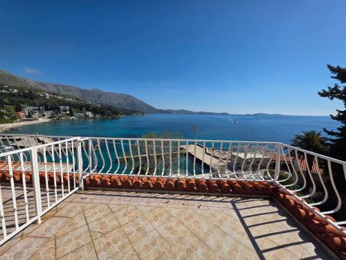 a balcony with a view of the water at Guest House Daniela in Mlini