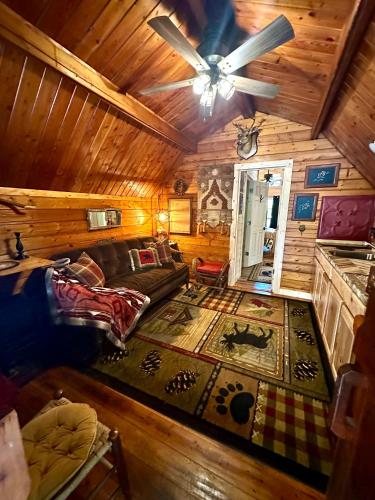 an overhead view of a living room in a log cabin at The Drake Cabin in The Forest in Cosby