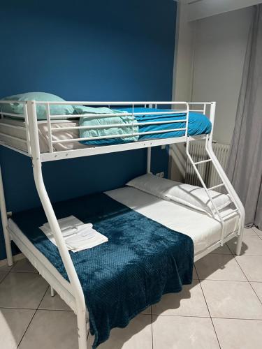 a couple of bunk beds in a room at A&S Luxury Apartment in Kavála