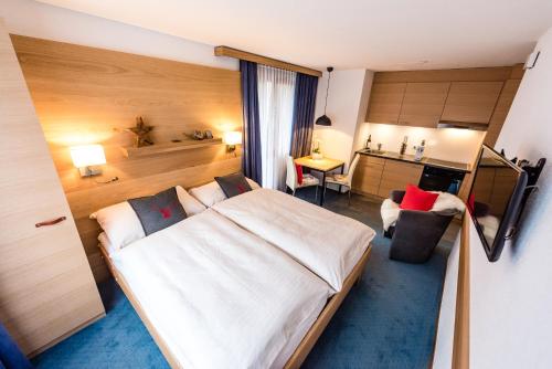Postel nebo postele na pokoji v ubytování Chalet Achat
