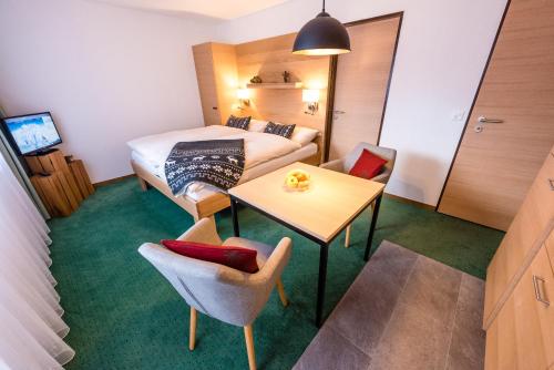 TV a/nebo společenská místnost v ubytování Chalet Achat