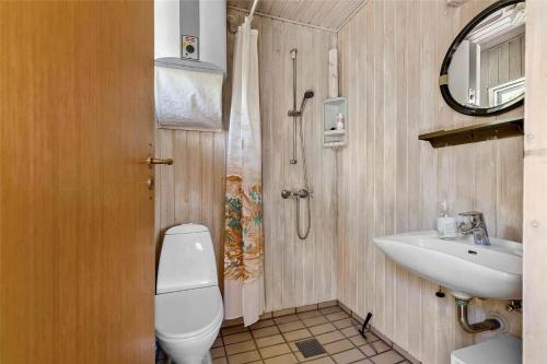 a bathroom with a toilet and a sink at SL078-Slagelse-Dybkaervej-36 in Slagelse