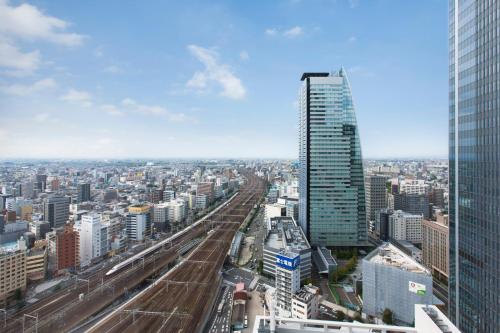 a view of a city with a tall building at Nagoya JR Gate Tower Hotel in Nagoya