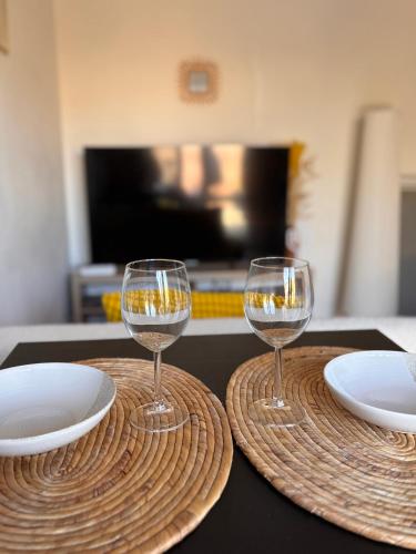 two glasses of wine sitting on top of a table at Caseta Cosi in Vic-la-Gardiole