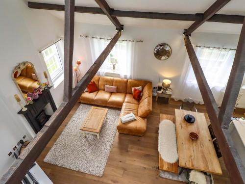 an overhead view of a living room with a couch and a table at Treetops, Alnwick in Alnwick