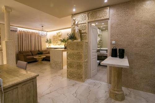 a large room with a living room and a bathroom at CENTAURIA Greek Luxury Suite 5' Port Gate 7-8 & Cruises Gate 11-12 in Piraeus