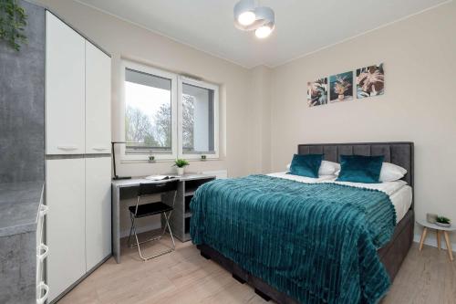 Modern Apartment with Parking and Balcony by Noclegi Renters