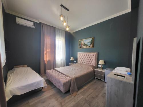 a bedroom with two beds in a room at Gabala Comfort Inn in Gabala