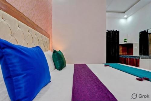 a bedroom with a large bed and a swimming pool at The MoonLight Hotel in Zirakpur