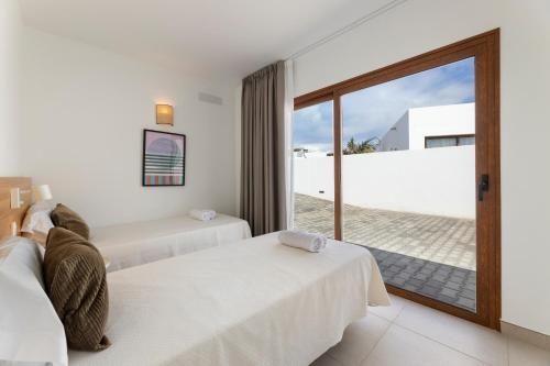 Villa Los Altos Famara 11A by Escape Home