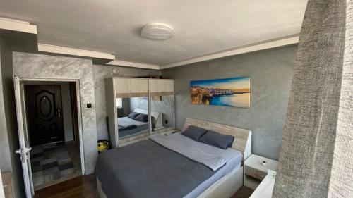 a bedroom with a large bed in a room at Modern Stay Provadia in Provadiya
