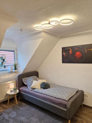 a bedroom with a bed in a room at Daheim in Burk in Burk