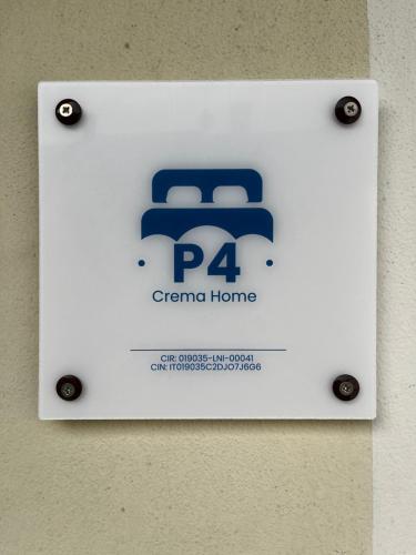 a sign for a german home on a wall at P4 Crema Home in Crema