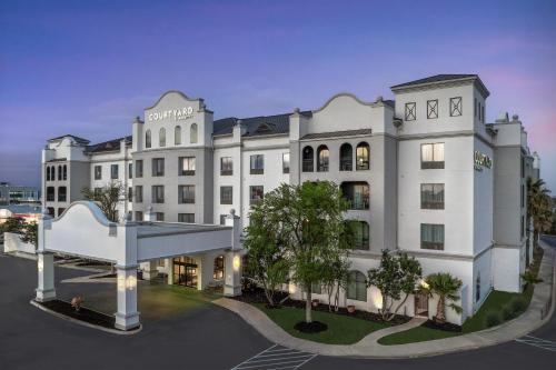a rendering of the front of a hotel at Courtyard by Marriott San Antonio SeaWorld Westover Hills in San Antonio