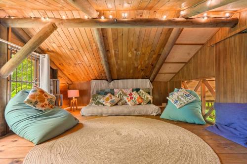 a room with two bean bags in a room at Canopy Lodge - Perfect Mauritius Trip in Tamarin