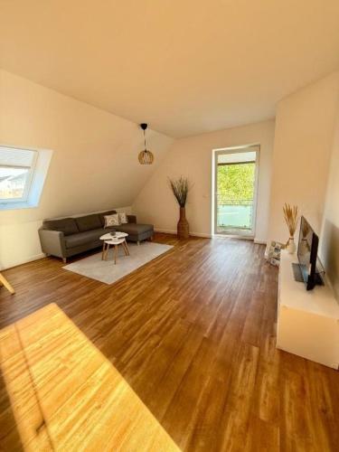 a living room with a couch and a table at Inselhus in Burg auf Fehmarn