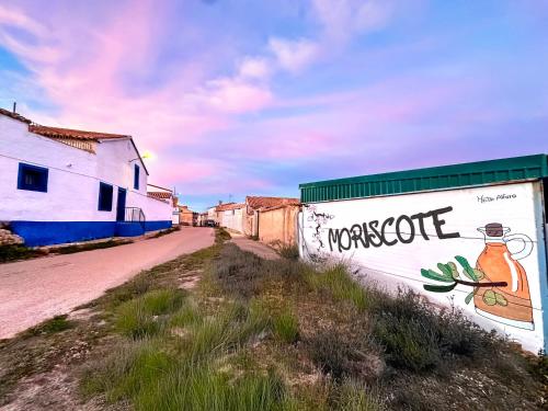 a street with a wall with a sign that says worcester at Alojamiento Rural La Tinaja in Ayna