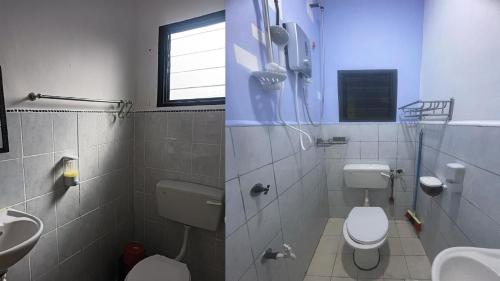 a bathroom with a toilet and a sink at Lin Homestay in Lahad Datu