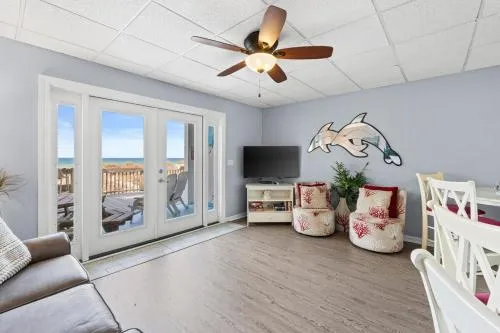 Gulf-Front Surf Club Condo 2BR, Spacious Balcony, Peaceful East End Beach Access photo 1