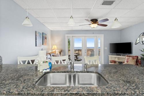 Gulf-Front Surf Club Condo 2BR, Spacious Balcony, Peaceful East End Beach Access photo 33