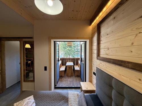 a room with a wall of wood paneling at Apartament Rodzinny Deluxe in Poronin
