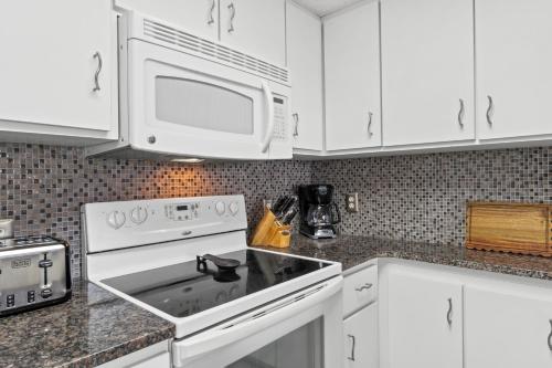Gulf-Front Surf Club Condo 2BR, Spacious Balcony, Peaceful East End Beach Access photo 46