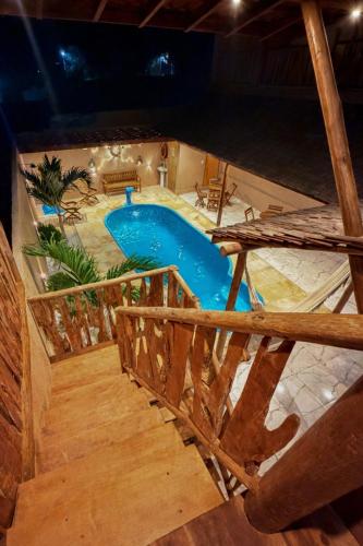 an overhead view of a swimming pool in a house at SP Hospedagem Canoa Quebrada in Canoa Quebrada