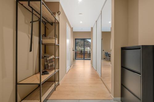 a hallway of a home with shelves and a hallway at Aurora Apartments - Stryn View in Stryn