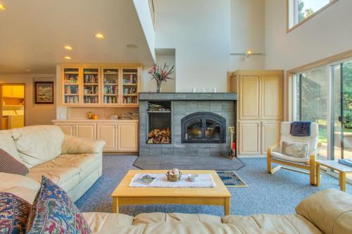 a living room with a fireplace and a couch at Webb House in Valley Crossing