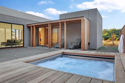 a house with a swimming pool on a deck at Sky Fall in Sea Ranch