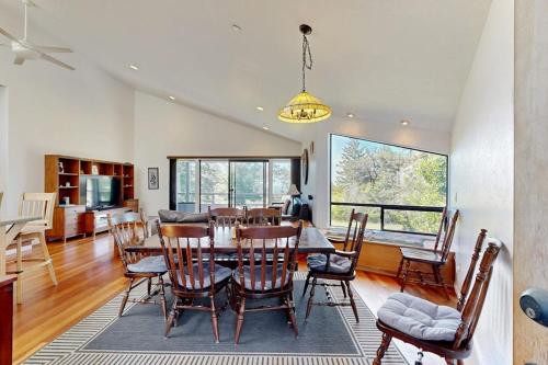 a dining room with a table and chairs at Footloose in Sea Ranch
