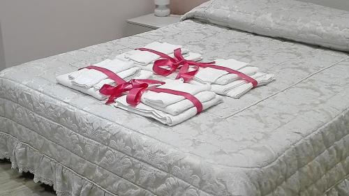 Ein Bett oder Betten in einem Zimmer der Unterkunft Carteo 2016