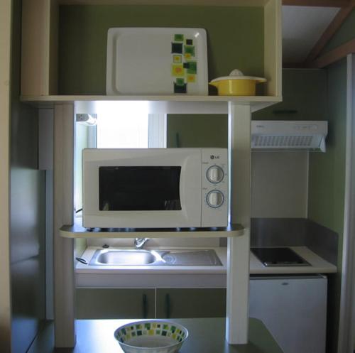 Η κουζίνα ή μικρή κουζίνα στο Camping Sella