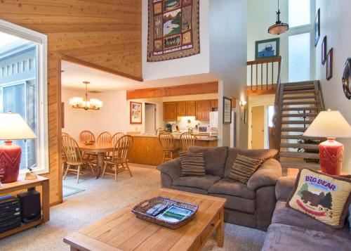 a living room with a couch and a table at 10 Quelah Condo in Sunriver