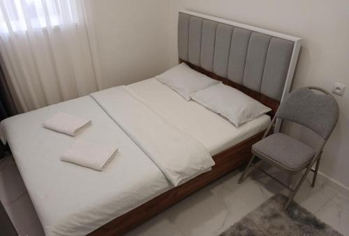 Llit o llits en una habitació de Hotel SLY