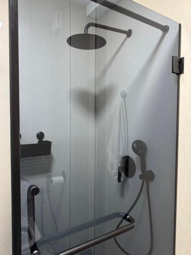 a shower with a glass door in a bathroom at Dolce dimora in Bar