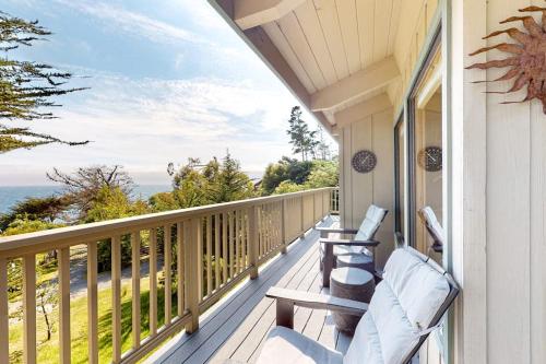 a porch with chairs and a view of the ocean at Eagle's Landing - Main House in Gualala