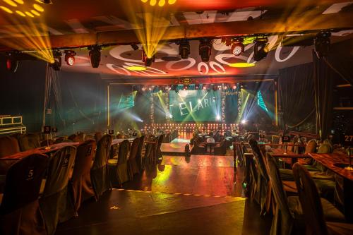an empty auditorium with a stage and chairs at Fiesta Americana Reforma in Mexico City