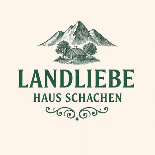 ein Logo, das ein Haus vor einem Berg zeigt. in der Unterkunft Landliebe in Mittenwald