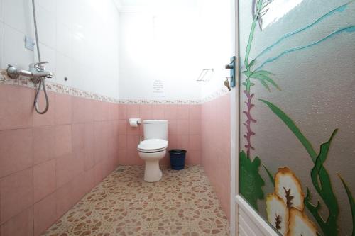 Koupelna v ubytování Baba Homestay