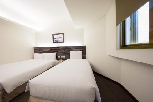 Katil atau katil-katil dalam bilik di Ful Won Hotel