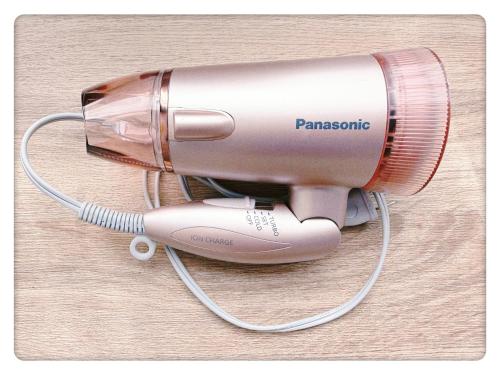 a hair dryer is attached to a hair dryer at Hao Bros. Home in Tokyo