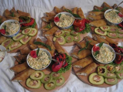 a bunch of different types of food on a table at Risto's Guest House in Ohrid