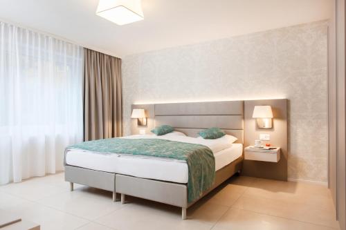 Letto o letti in una camera di CITY STAY - Lindenstrasse